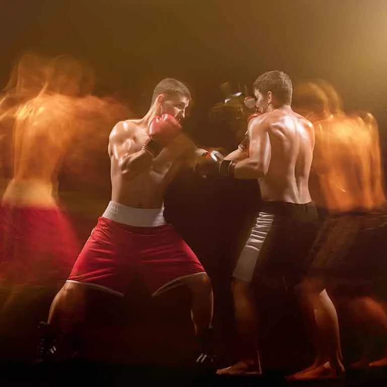 Boxeadores luchando