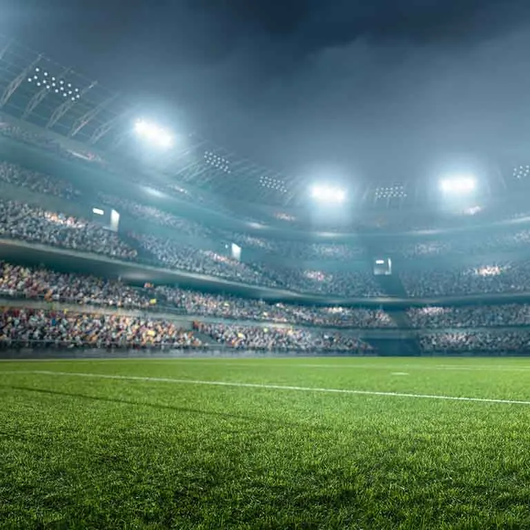 Estadio de futbol iluminado